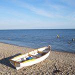 The 5 Best Getaways from NYC for Labor Day Boat Out ot Sea e1502377983425