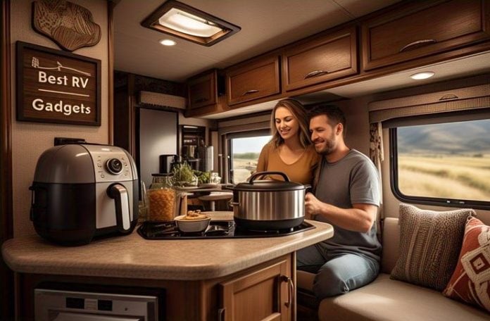 couple in their RV kitchen cooking